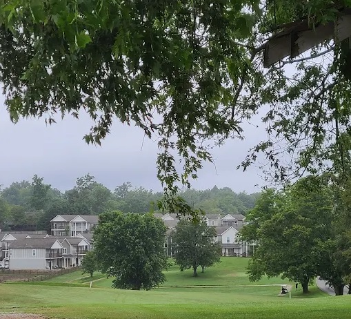 Belle Acres Golf Course Cookeville, TN - Pristine putting green with strategic bunkers and mature landscaping, Public 9-hole Tennessee golf course