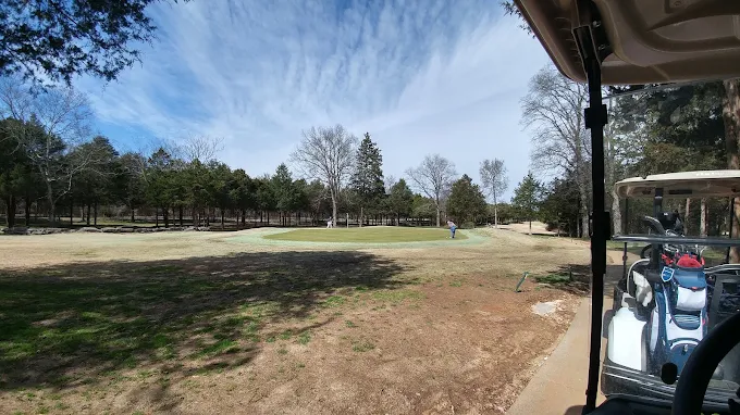 Cedar Crest Golf Club Murfreesboro, TN - Pristine putting green with strategic bunkers and mature landscaping, Public 18-hole Tennessee golf course