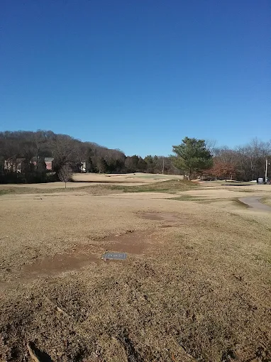 Cheekwood Golf Club Franklin, TN - Pristine putting green with strategic bunkers and mature landscaping, Public 9-hole Tennessee golf course