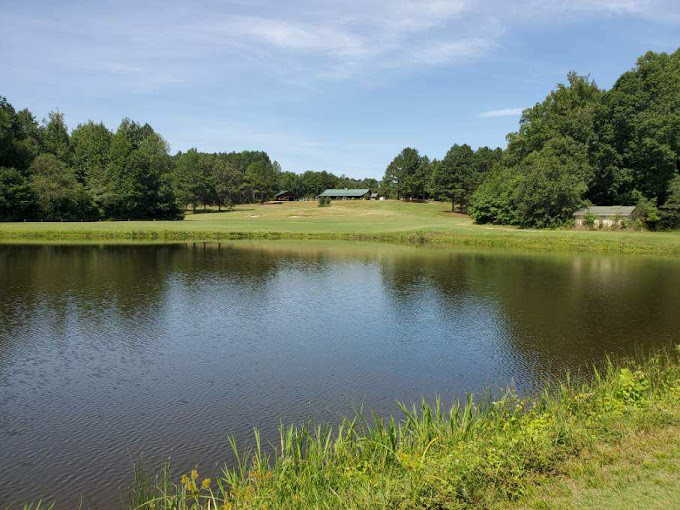 Chickasaw Golf Course Henderson TN - Panoramic fairway view hole 12 with strategic bunkers and mature trees