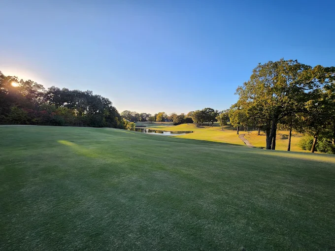 Colonial Country Club Cordova, TN - Pristine putting green with strategic bunkers and mature landscaping, Private 18-hole Tennessee golf course