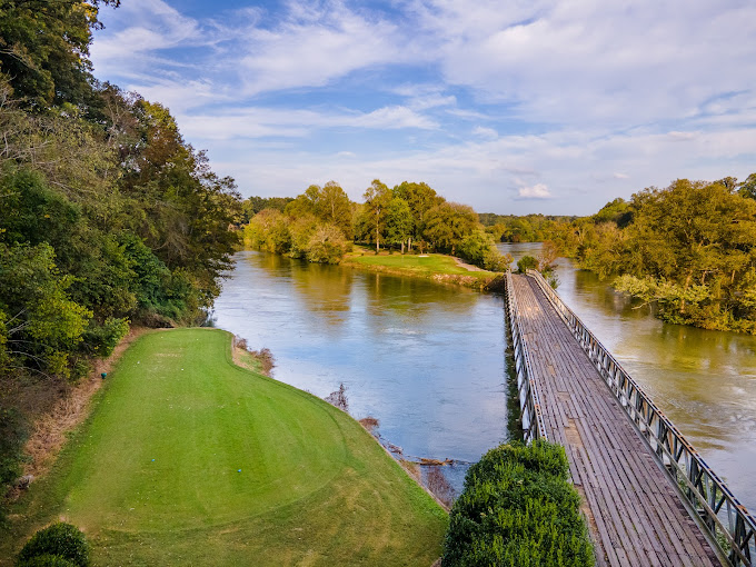 Island Pointe Golf Club Kodak TN - Panoramic fairway view hole 12 with strategic bunkers and mature trees