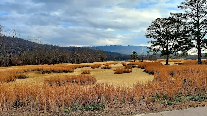 Sweetens Cove Golf Club South Pittsburg TN - Championship golf course entrance with professional landscaping and signage