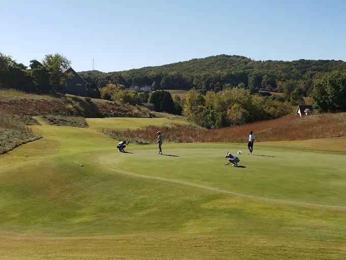 The Links at Kahite Tellico Village TN - Championship golf course entrance with professional landscaping and signage