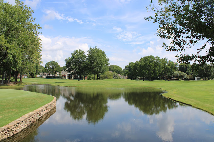 TPC Southwind Memphis TN - Panoramic fairway view hole 12 with strategic bunkers and mature trees