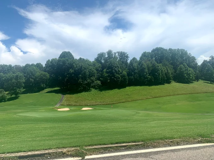 Warrior\ Kingsport TN - Championship golf course entrance with professional landscaping and signage