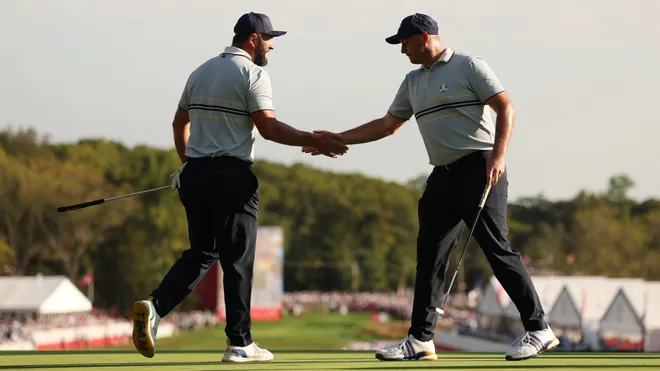 Tommy Fleetwood and Rory McIlroy celebrate during their dominant foursomes victory at Bethpage Black